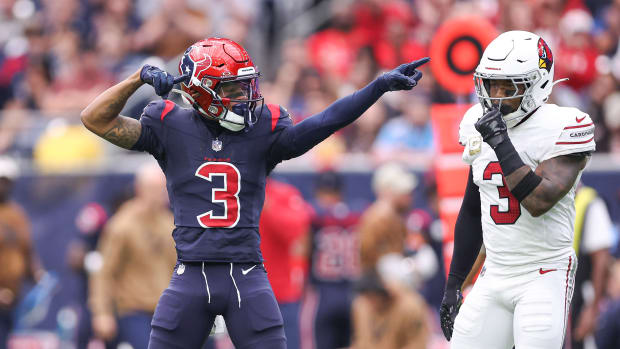 Houston Texans wide receiver Tank Dell (3) signals a first down after a play during the first quarter against the Arizona Cardinals at NRG Stadium.